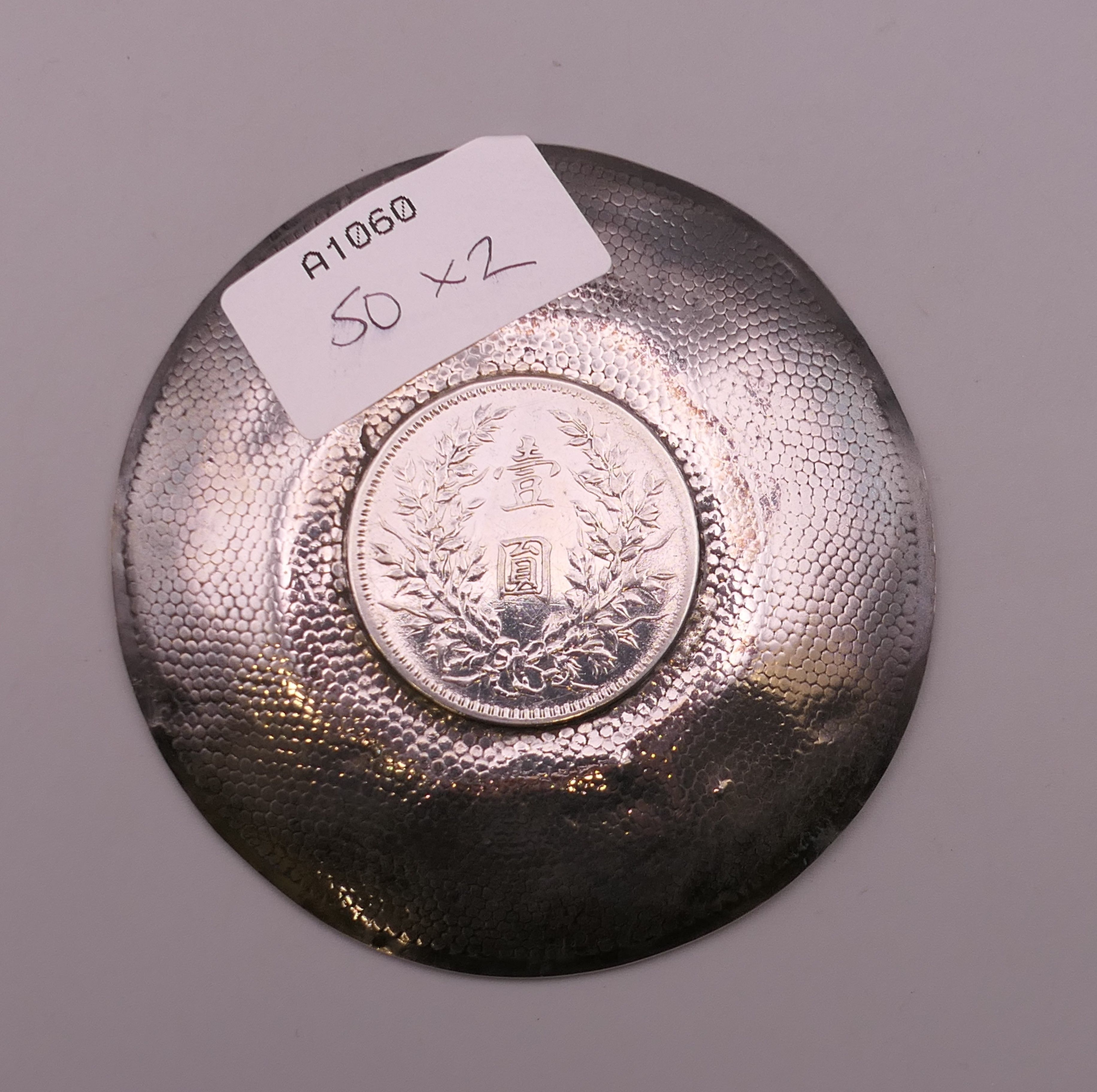 Two Chinese silver dishes inset with coins. 9.5 cm diameter. 117.9 grammes total weight. - Image 5 of 5