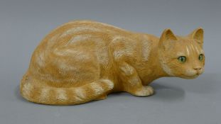 A pottery model of a cat. 33 cm long.