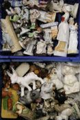 A quantity of porcelain figurines and animals.