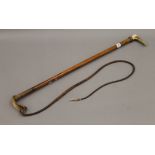 A Victorian antler handled riding whip.