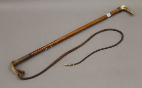 A Victorian antler handled riding whip.