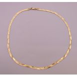 A 14 K gold necklace. 41 cm long. 12.2 grammes.