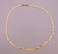A 14 K gold necklace. 41 cm long. 12.2 grammes.