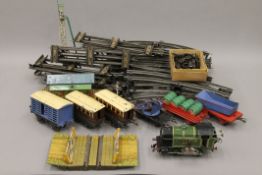 A Hornby clockwork train set, including a wagon of Castrol barrels.