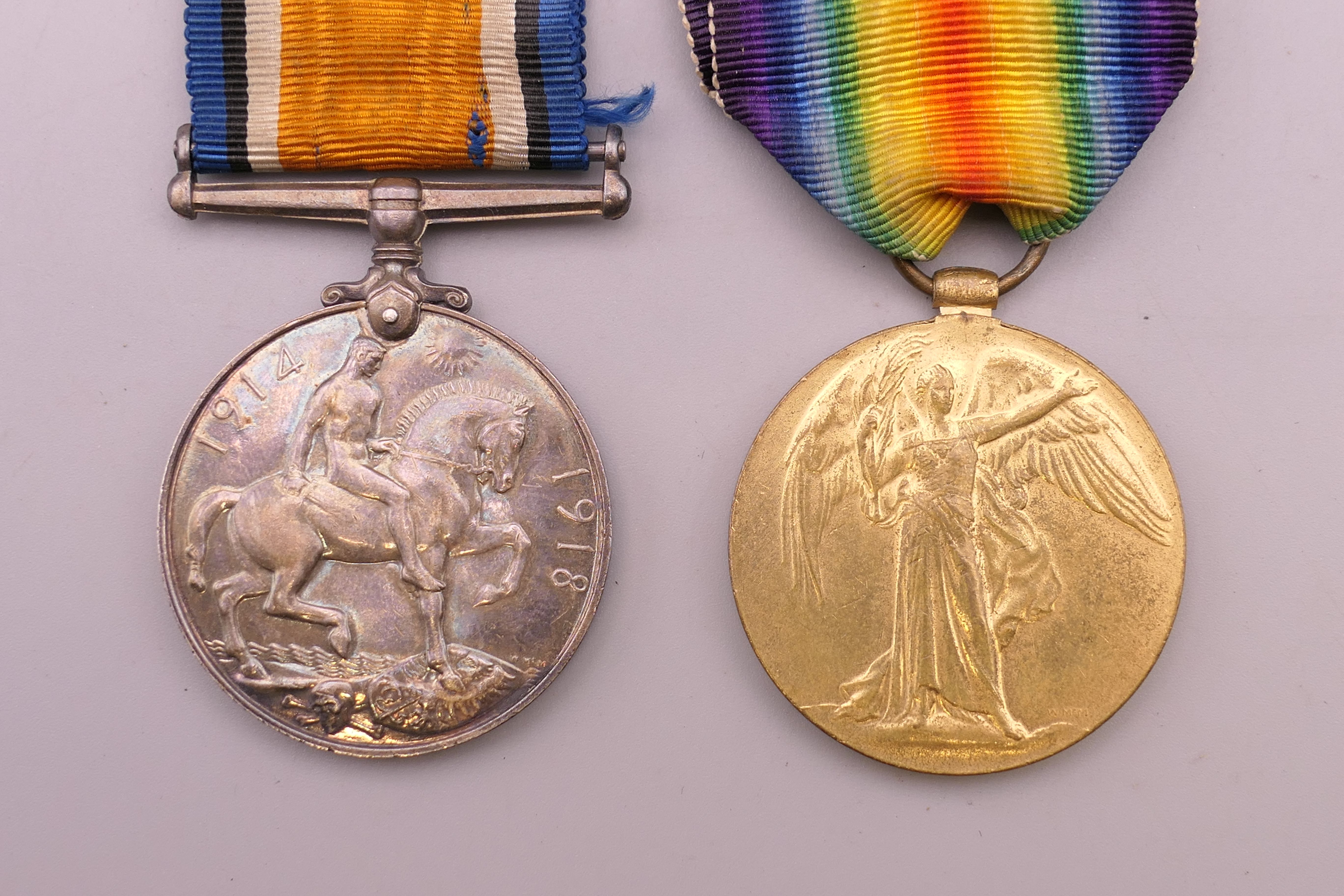 A pair of WWI Service medals awarded 50850 PTE A E MEWBURN MANCHESTER REGIMENT. - Image 2 of 4