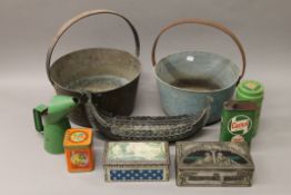 Two brass jam pans, tins and a Scandinavian model of a boat.