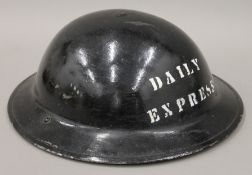 A WWII Press helmet, inscribed 'Daily Express'.