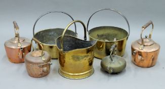 A quantity of various brass and copper wares, including jam pans and kettles.