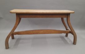 An early 20th century oak bench. Approximately 115 cm long.