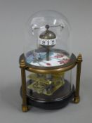 A fish clock. 13.5 cm high.