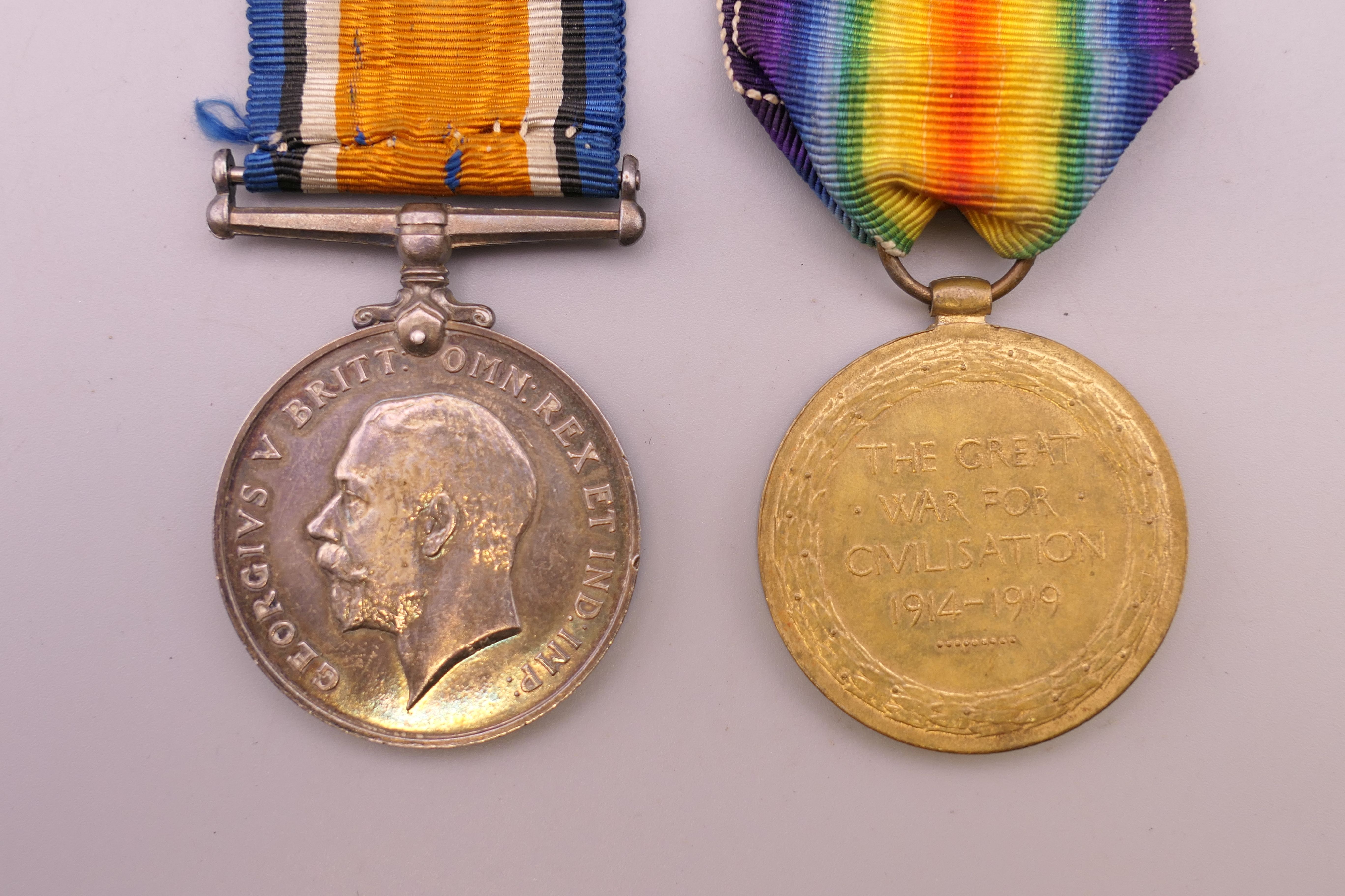 A pair of WWI Service medals awarded 50850 PTE A E MEWBURN MANCHESTER REGIMENT. - Image 3 of 4