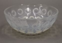 A small R Lalique France glass bowl. 13 cm diameter.
