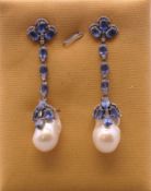 A pair of diamond, sapphire and pearl drop earrings. 6.75 cm long.