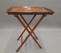A walnut butler's tray on stand. 68 cm wide.