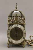 An 18th century style lantern clock. 37 cm high.