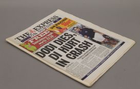 A copy of The Express on Sunday, 31st August 1997, with headline Dodi Dies, Di Hurt in Crash.