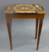 A Sorrento Ware musical side table. 37 cm wide.