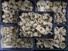 A large collection of crested ware.
