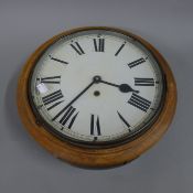 A Victorian dial clock. 38 cm diameter.