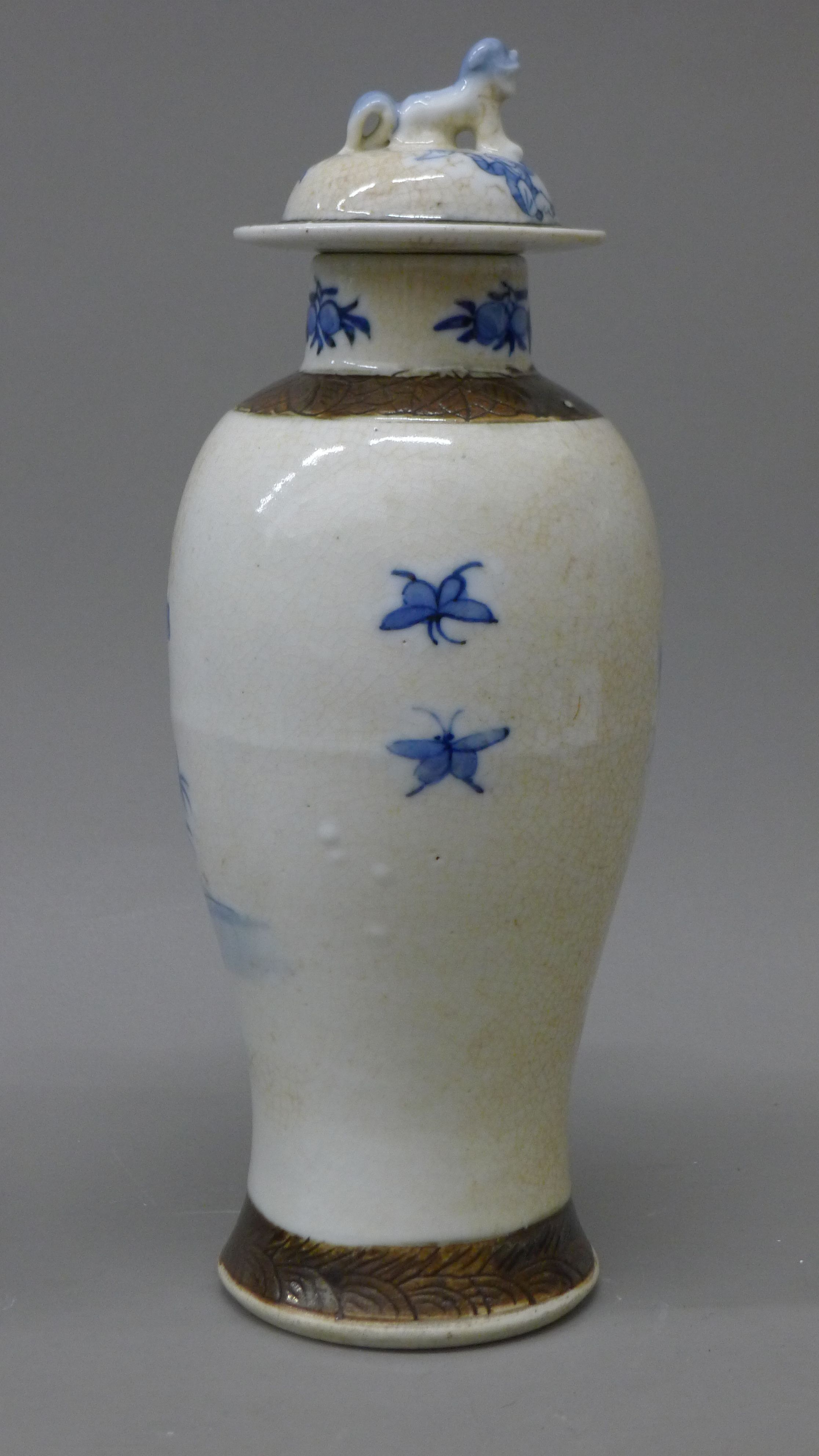 A pair of 19th century Chinese blue and white baluster vases and covers decorated with figures, etc. - Image 3 of 6