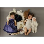 A quantity of vintage dolls and teddies.