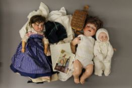 A quantity of vintage dolls and teddies.