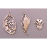 Three Kerry Richardson designer silver brooches. The largest 5.5 cm high.