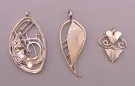 Three Kerry Richardson designer silver brooches. The largest 5.5 cm high.
