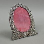 A sterling silver photograph frame. 17.5 cm high.