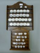 A quantity of Franklin Mint miniature masterpiece English silver plate collection and others.