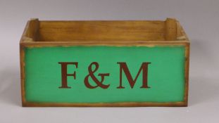 A F&M wooden box. 44 cm long.