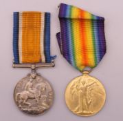 A pair of WWI Service medals awarded 50850 PTE A E MEWBURN MANCHESTER REGIMENT.