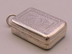 A silver vinaigrette, London 1807, makers mark indistinct. 3.5 cm x 2.25 cm.