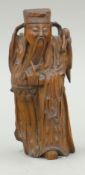 An 18th century Chinese carved hardwood figure of a dignitary. 16 cm high.