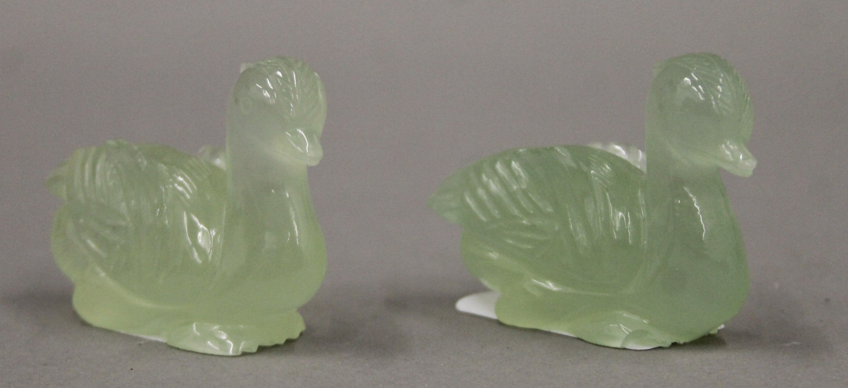 Two small Chinese jade ducks. 4 cm high.