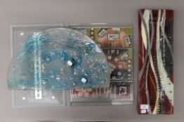 A quantity of various Art glass panels, including examples by Jane Charles. 50 cm long.