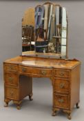 An early 20th century walnut dressing table.