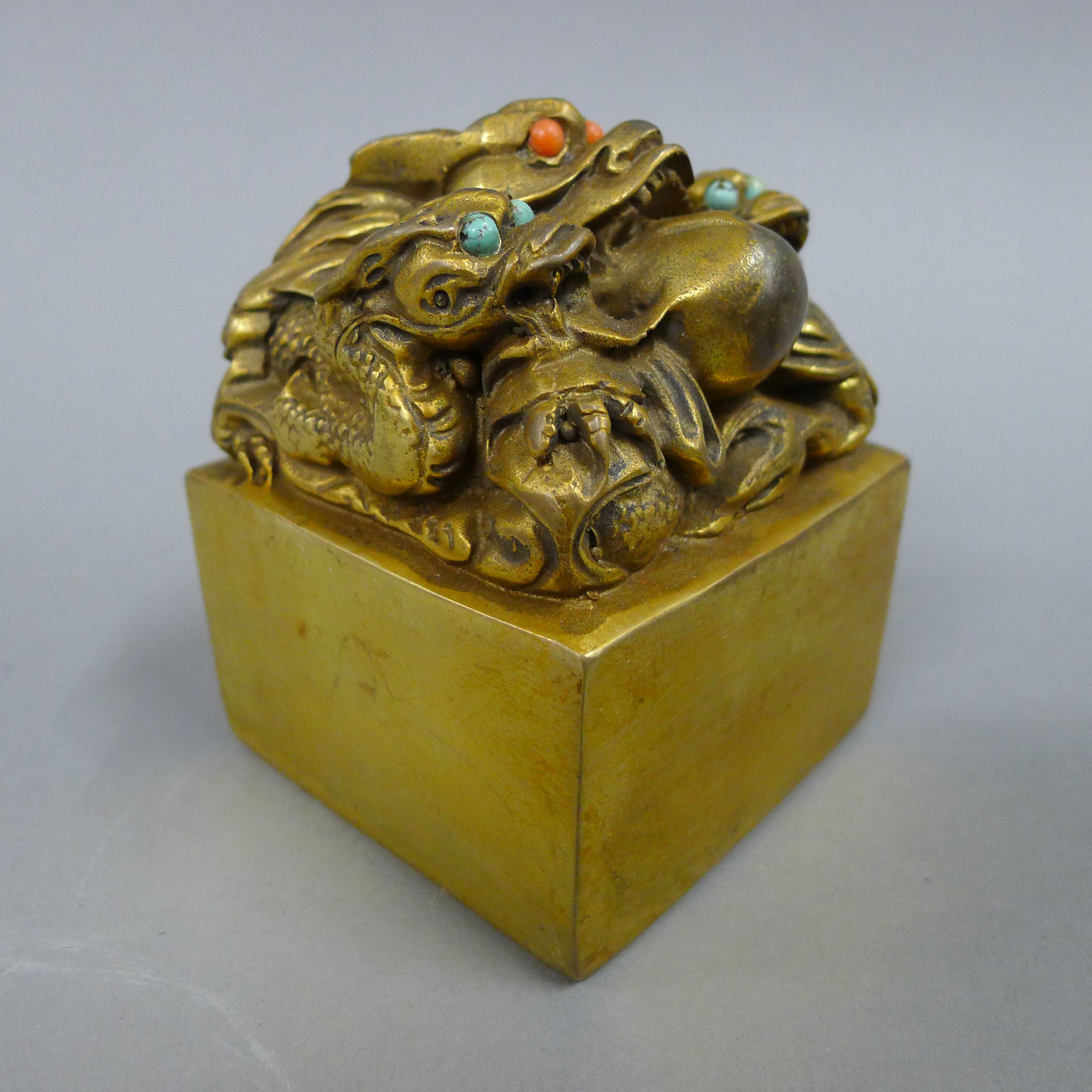 A Chinese bronze seal. 8.5 cm high.