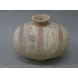 A Chinese cocoon jar, possibly Han Dynasty. 74 cm wide.