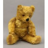 A vintage musical teddy bear. 45 cm high.