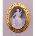 An unmarked gold framed hardstone cameo brooch. 4.5 cm high. 17.3 grammes total weight.