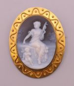 An unmarked gold framed hardstone cameo brooch. 4.5 cm high. 17.3 grammes total weight.