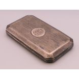 A silver cigarette case. 8.5 cm wide. 63.5 grammes total weight.