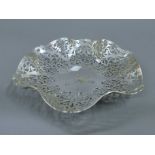 An Irish pierced silver dish. 23.5 cm diameter. 293.6 grammes.