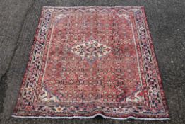 A Hamadan carpet. 210 x 140 cm.