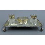 A cut glass mounted silver desk stand. 25 cm wide. 21.4 troy ounces.