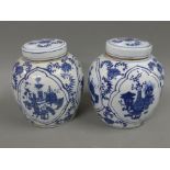 A pair of Chinese blue and white porcelain ginger jars. 23 cm high.