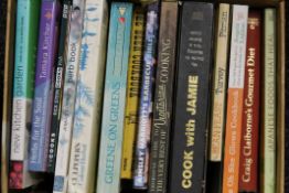 A box of cookery books.