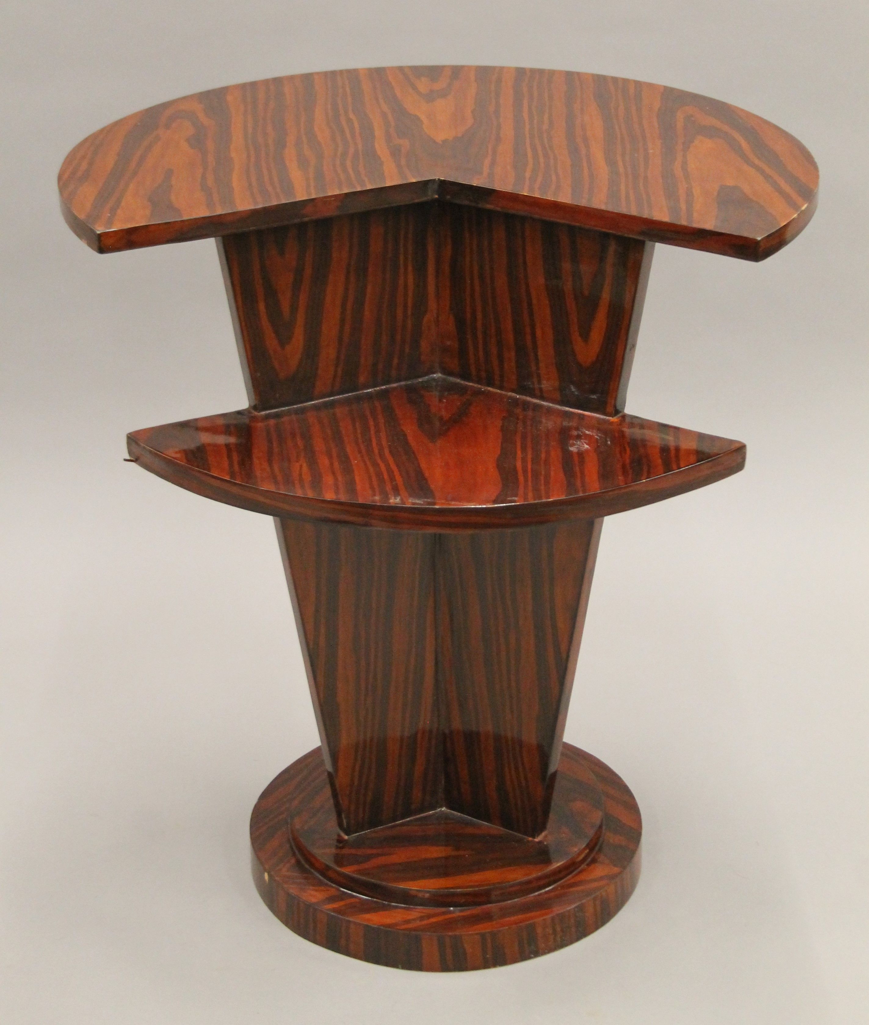 An Art Deco style table. 65 cm high.