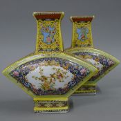 A pair of Chinese fan shaped porcelain vases. 21 cm high.